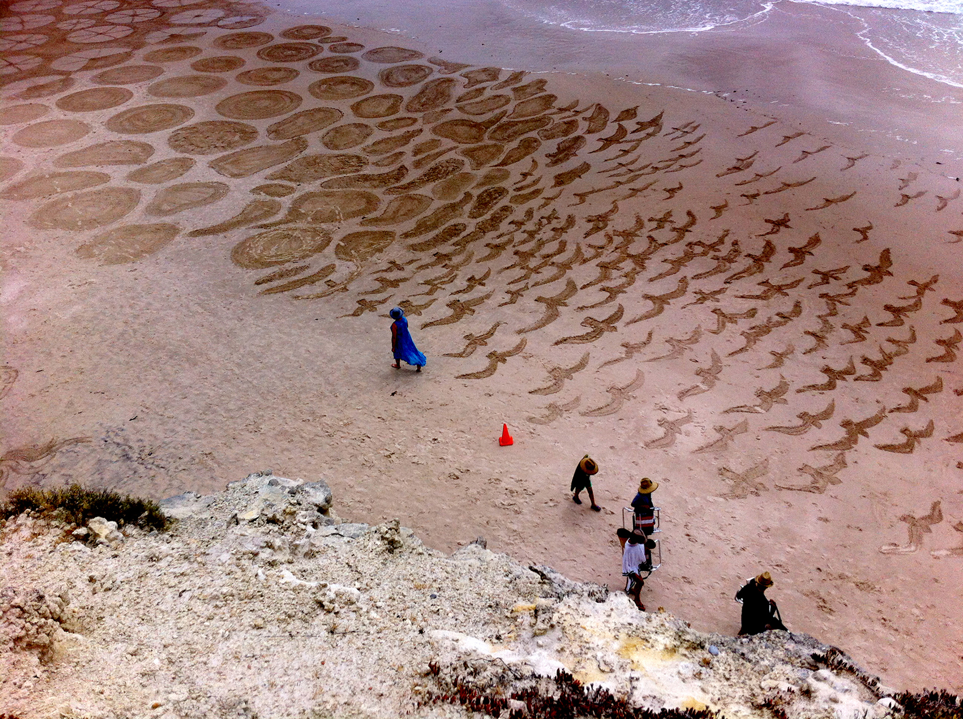   Wheels in Flight , 2015. Laura Wills and local community. Large scale sand drawing, Port Willunga beach, South Australia. Commissioned by City of Onkaparinga Council, for the community programs section of the 2015 Tour Down Under. 