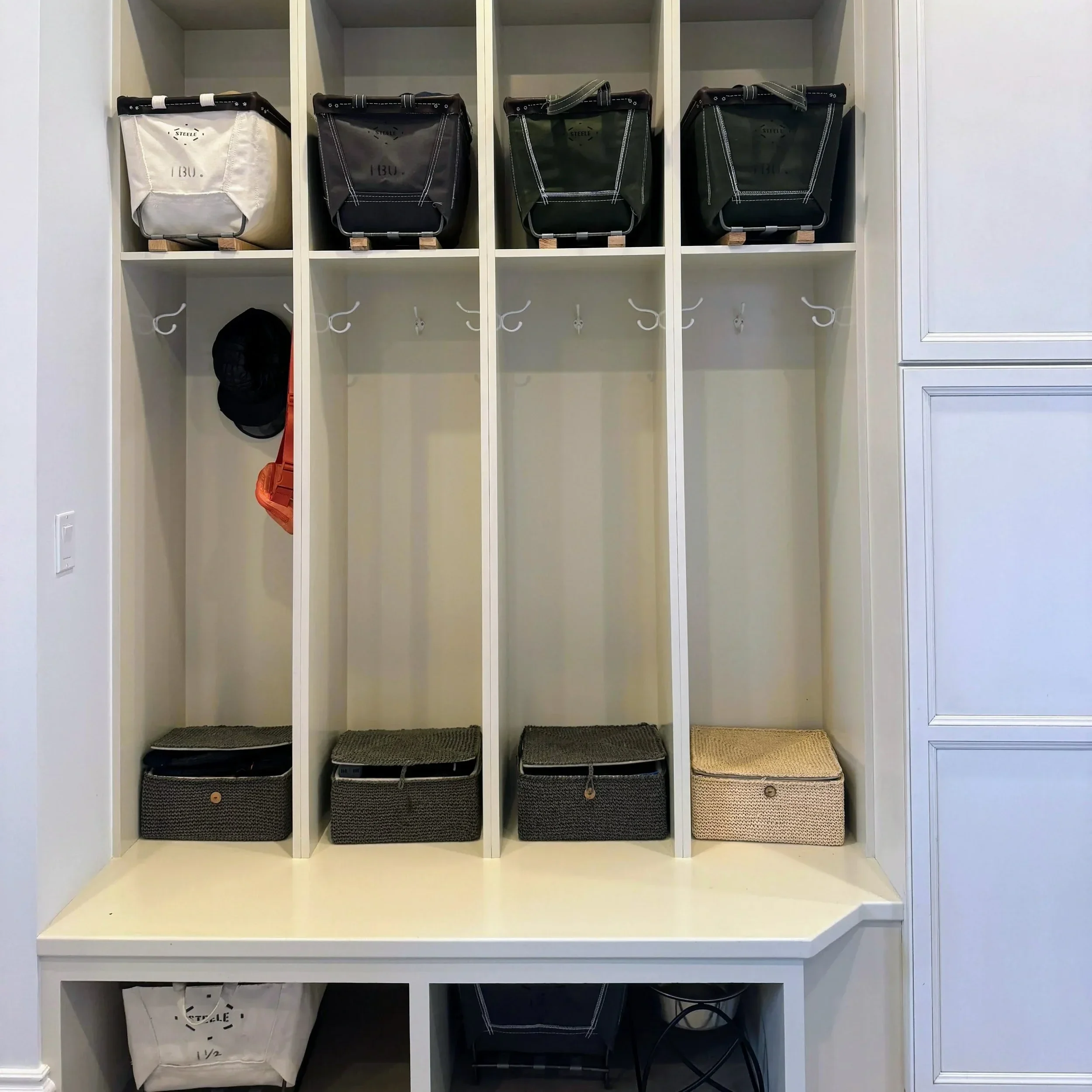 Mudroom Organized with rope bins and pull out containers