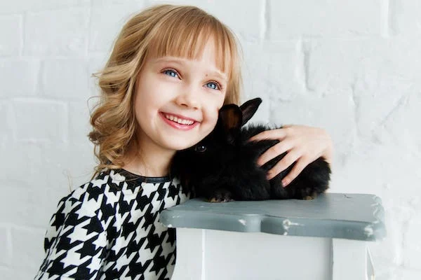 SEGALL-child-with-bunny-smiling-child-therapy-min.jpg