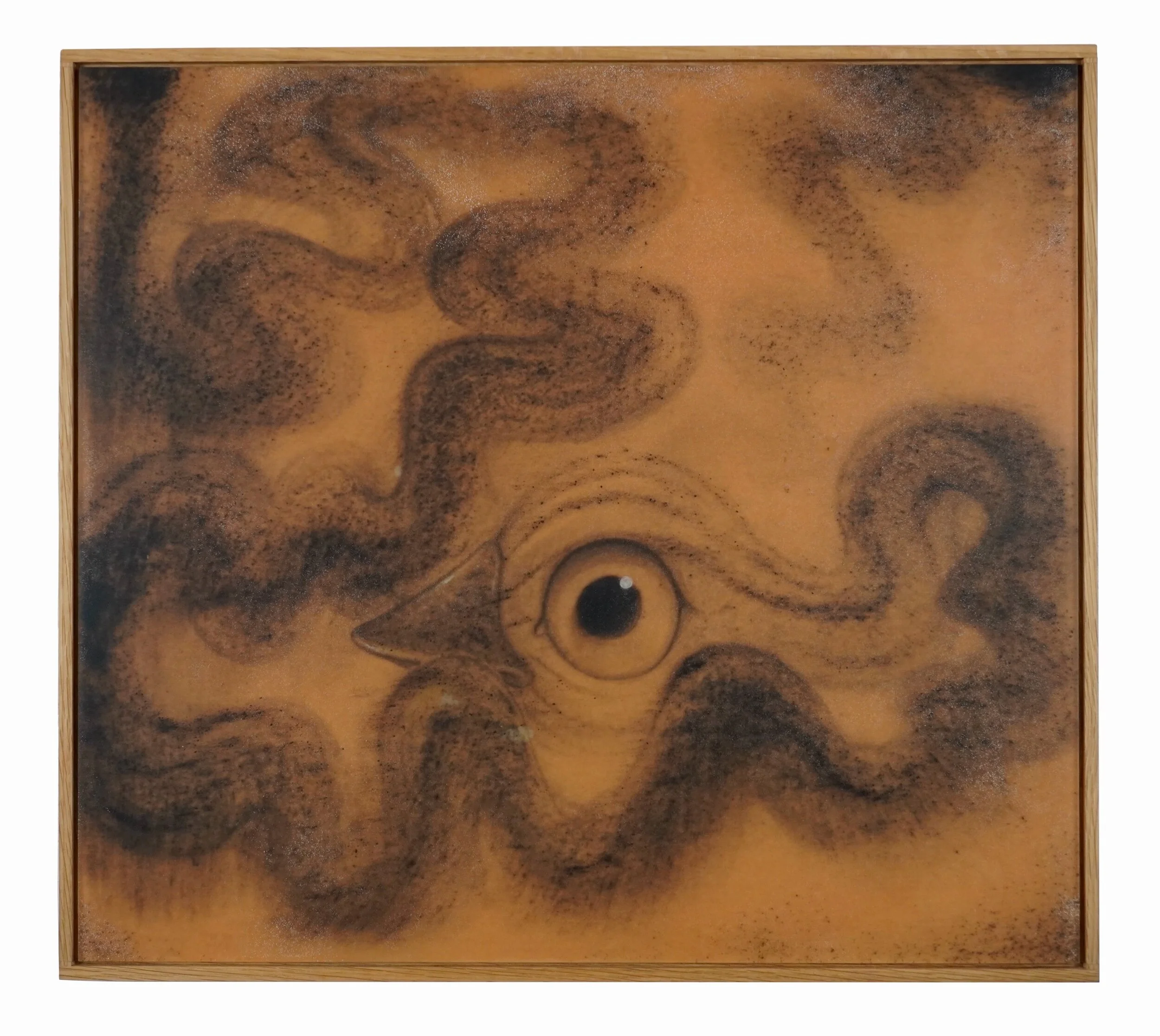 A framed abstract artwork with swirling dark brown and black patterns on a light brown background.