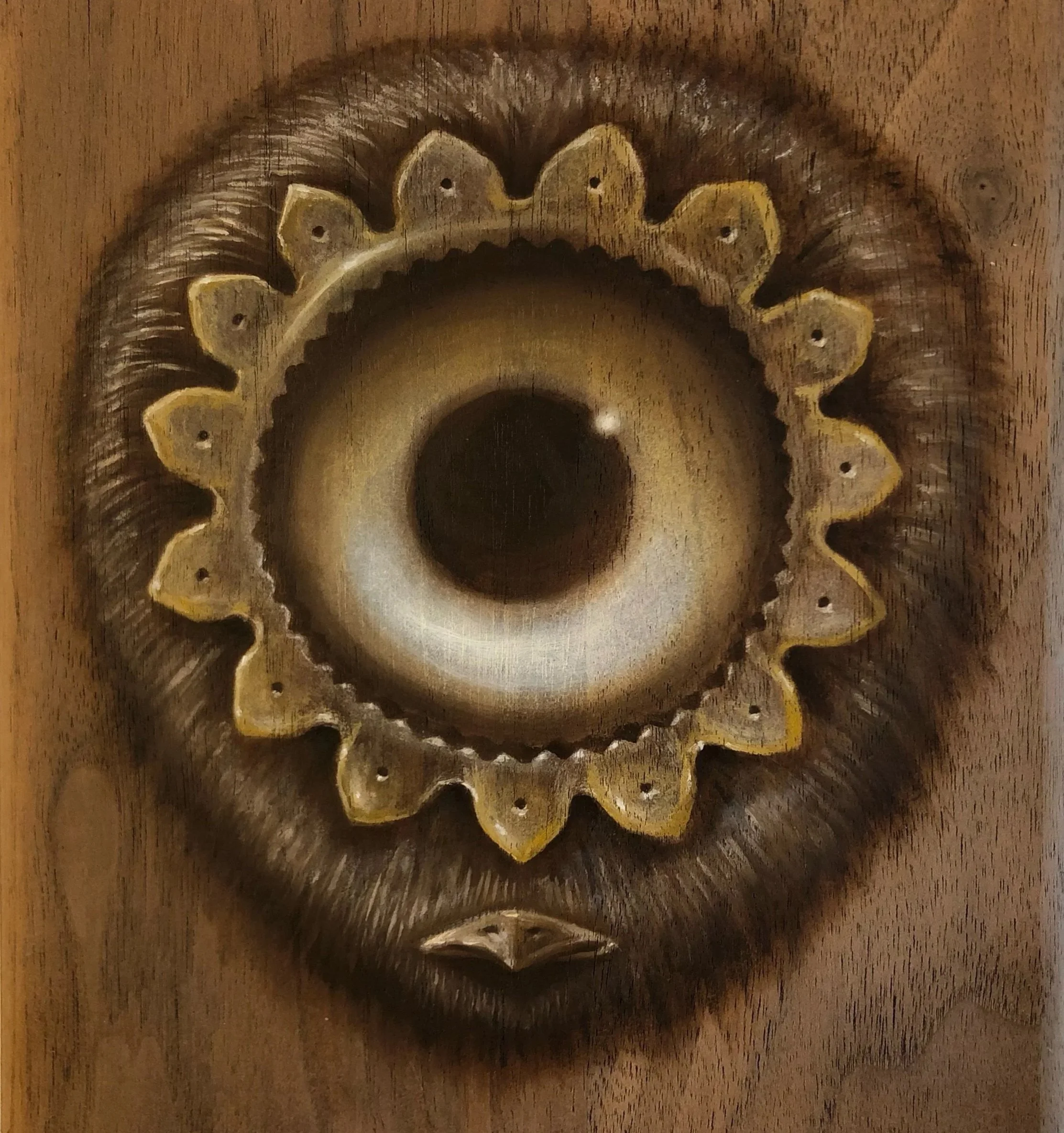Close-up shot of a wooden carved decorative piece with a circular shape and a scalloped edge, positioned on a wooden surface.