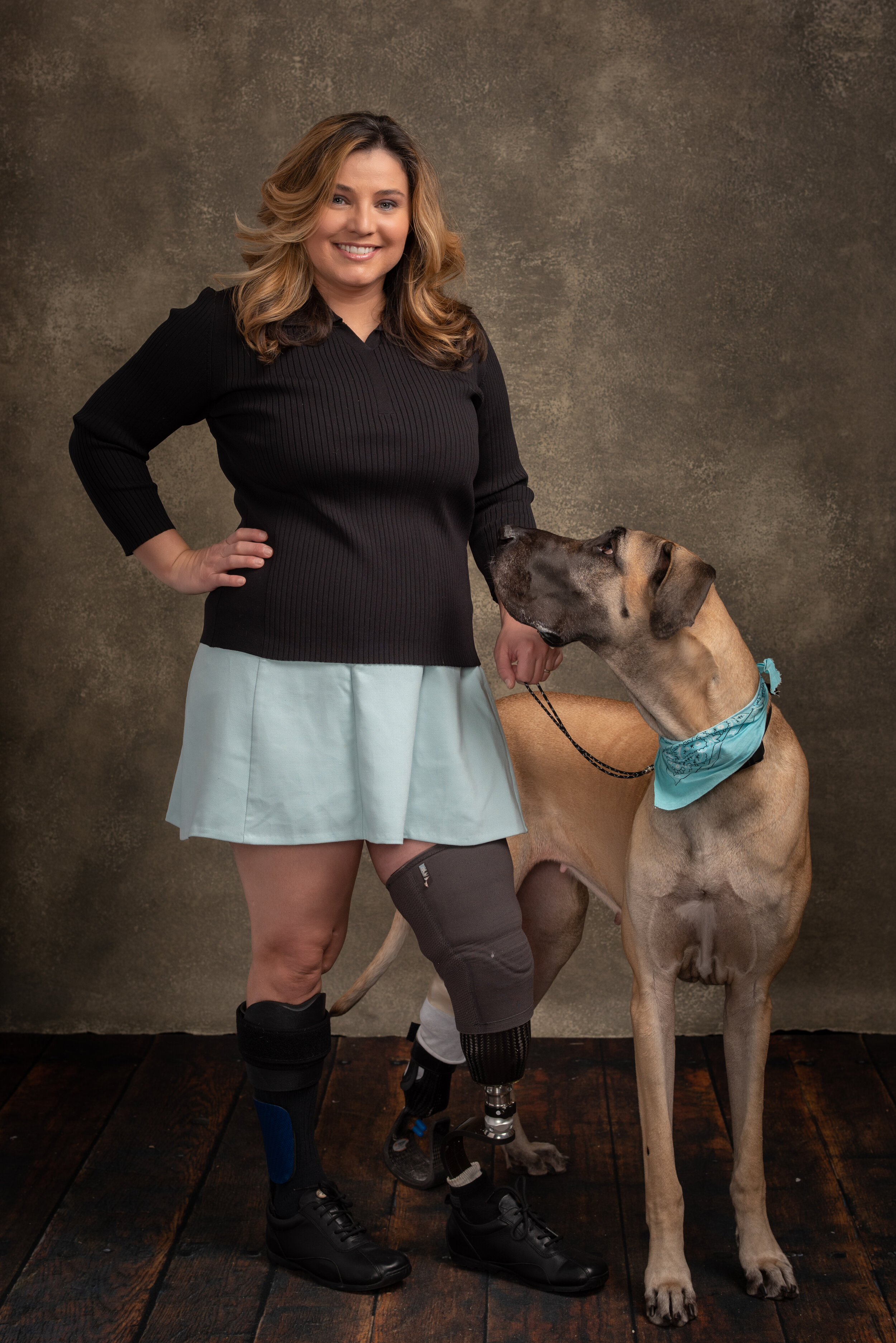 Beautiful-Young-Curvy-Model-with-Dog-studio-portrait