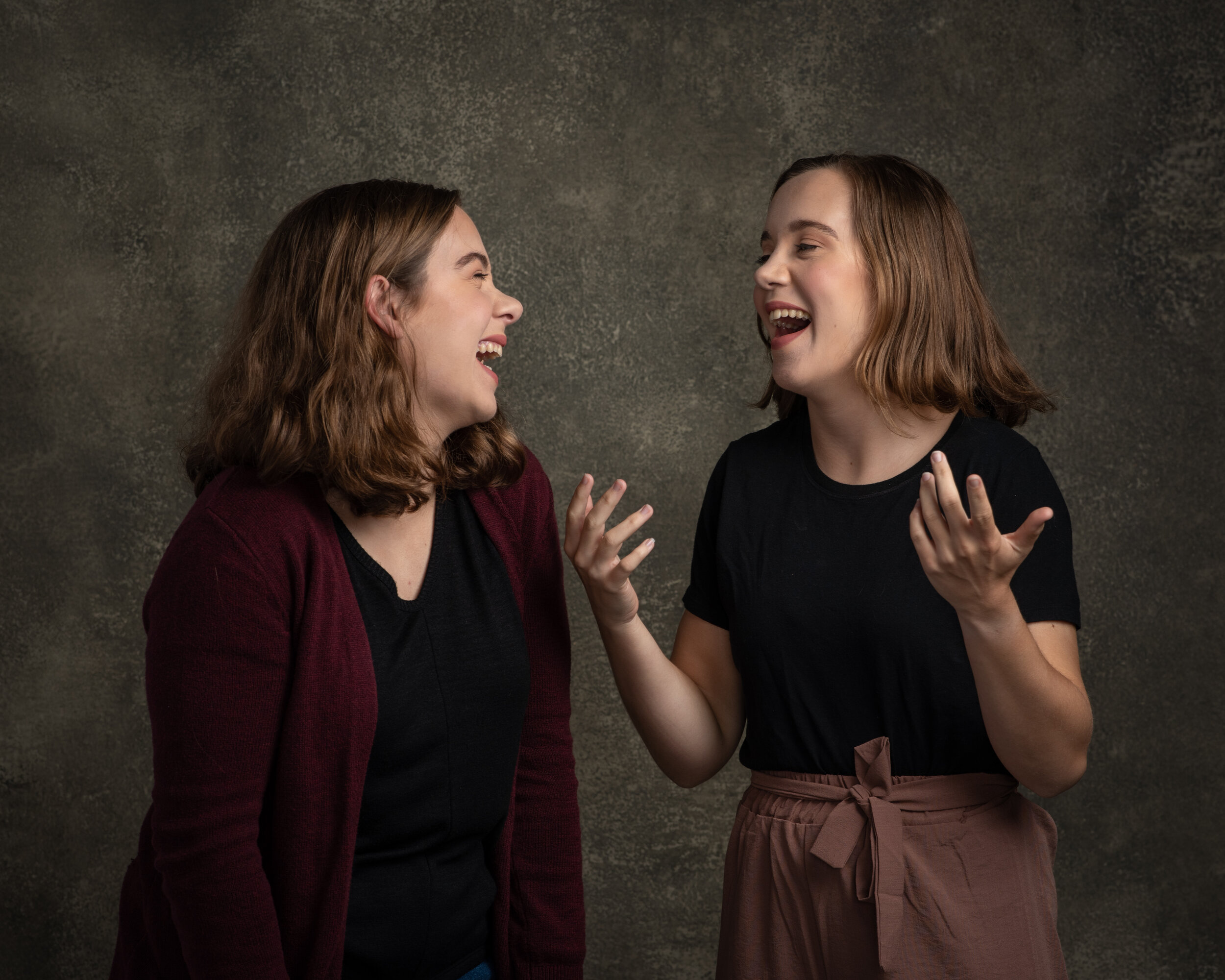 studio-portrait-young-twin-sisters