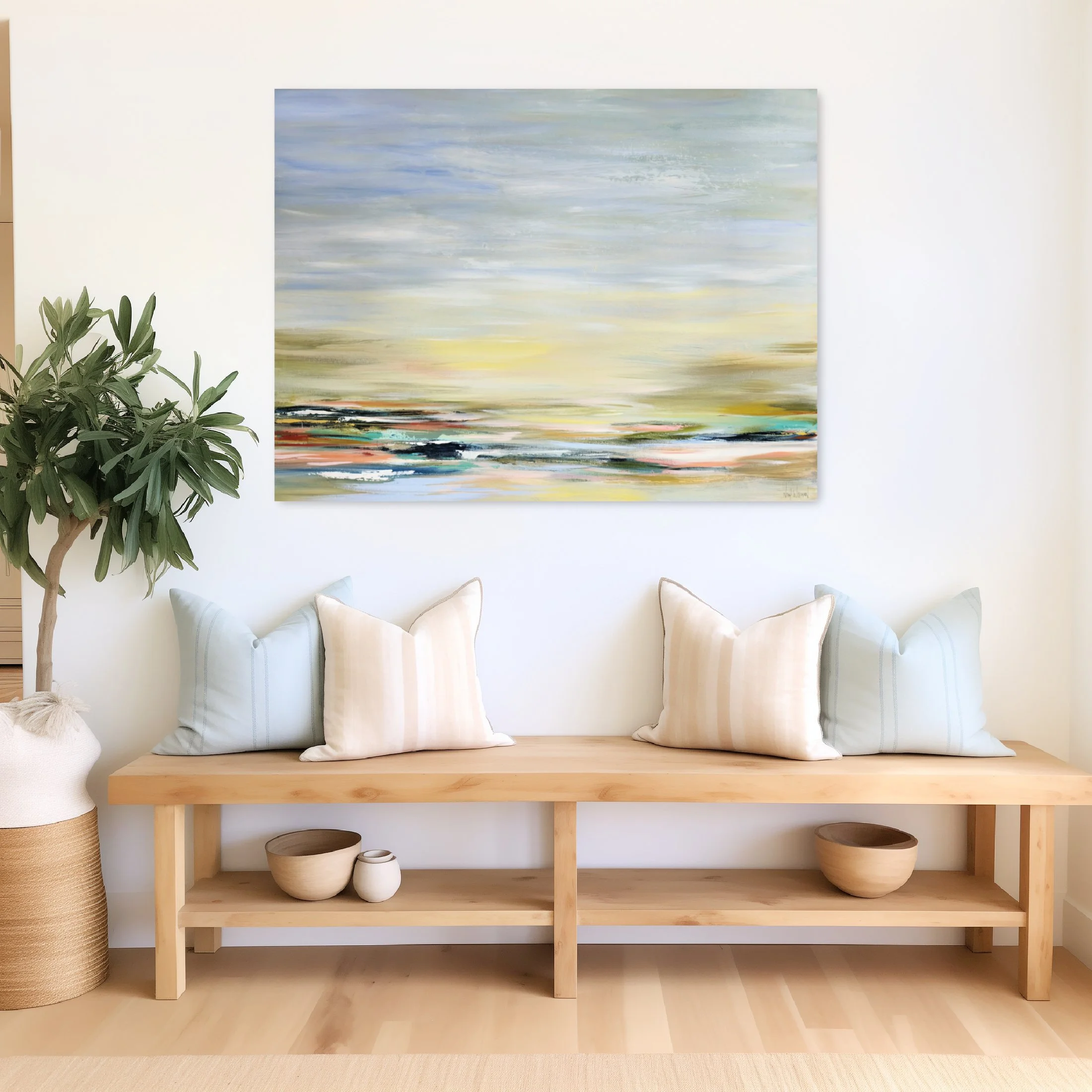 Coastal seascape painting by Nikol Wikman in a bright entryway.jpg