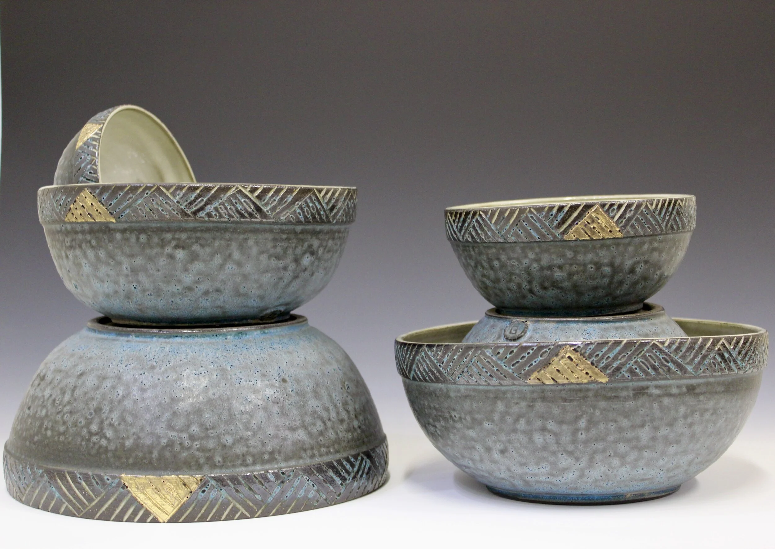 “Like Bearing Good News” — Nested Bowl SetBrown Stoneware, Mishima Carving, Gold Lustre2021