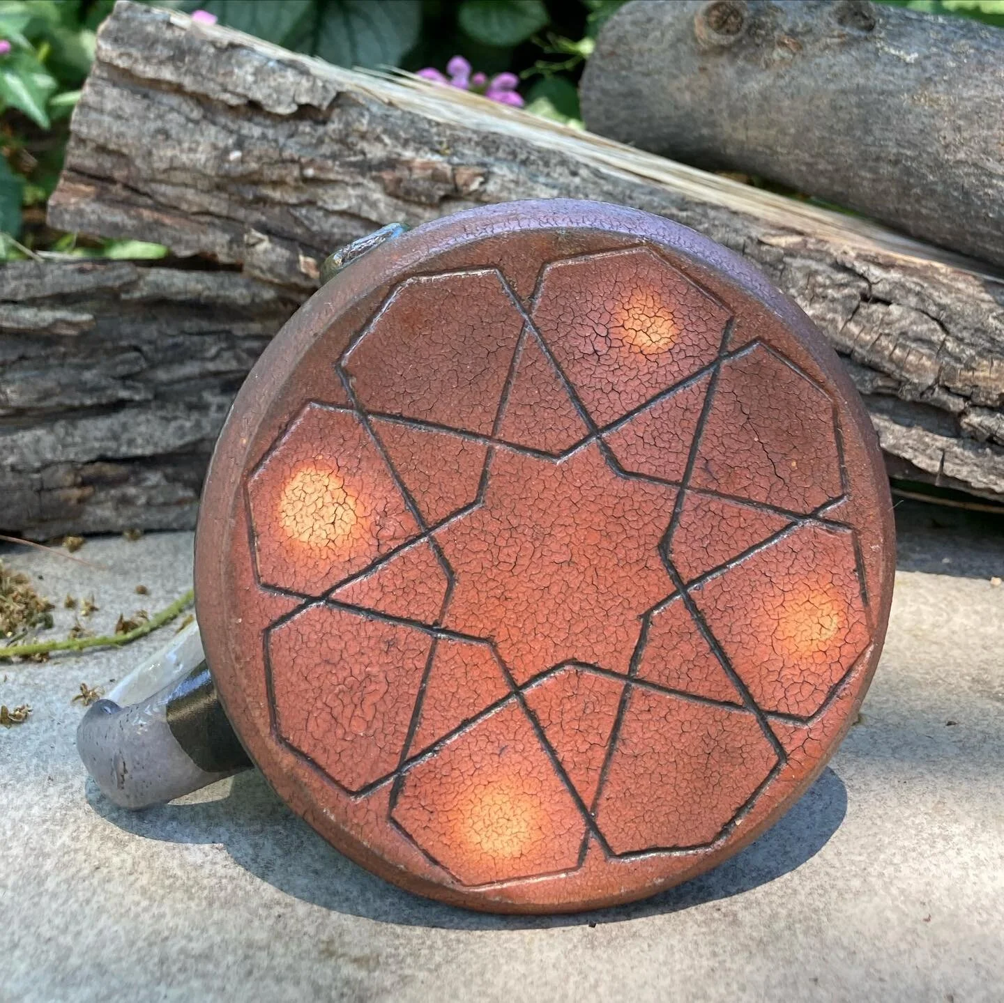 A lantern mug from the woodkiln. You can see how the flames shot around the circular wads on the bottom and left marks on the flashing slip. π#capturedevanescence #lookatdatash #butnotcigarash #theresacookieinthebackofthekilnforyou #partoftheshippar