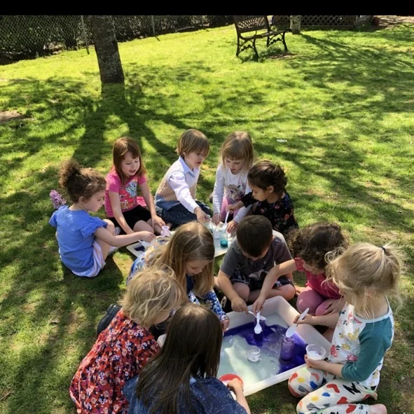 Students working hard at nature play in our expansive outside garden and play area.