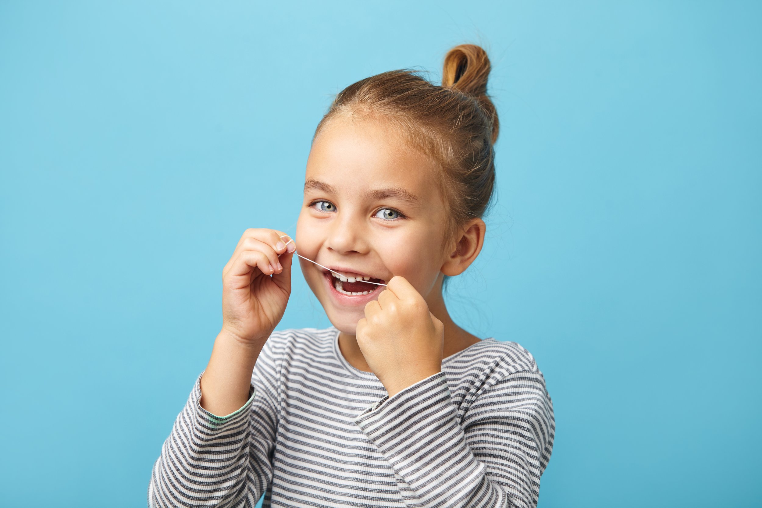 When Should My Child Start Flossing Their Teeth?