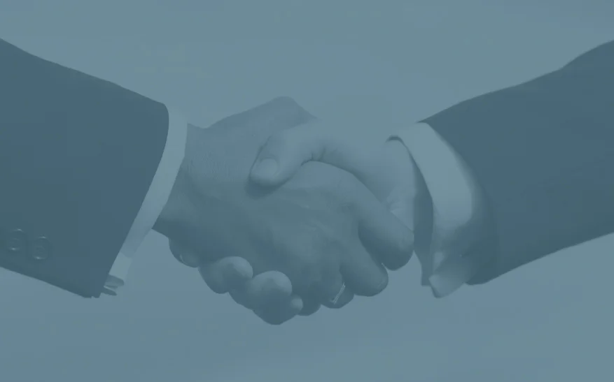 A handshake welcoming a new working relationship
