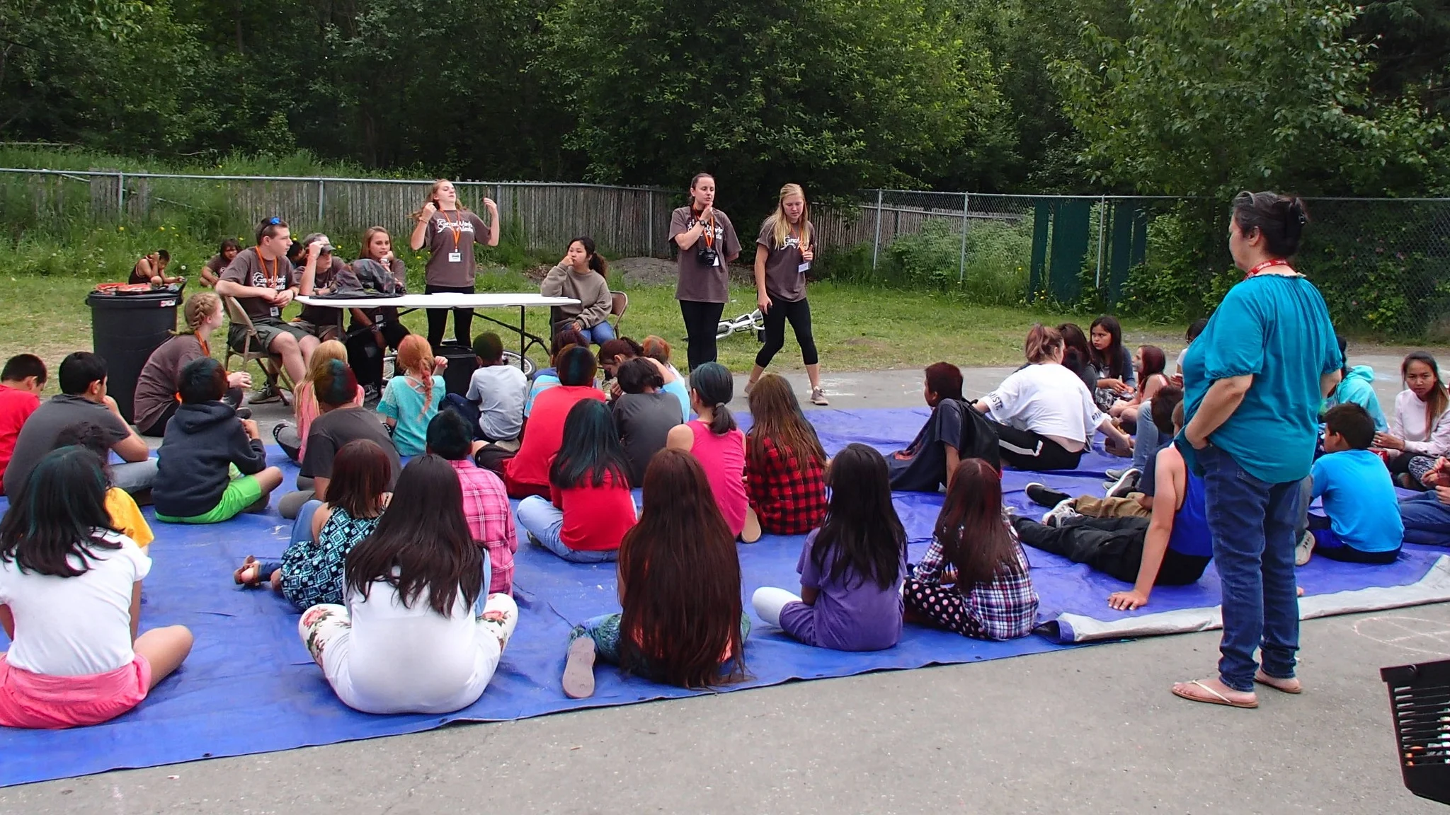 One of the Graceworks teams gives a gospel message at the weekly block party.