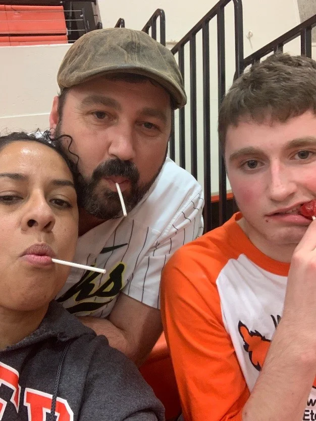 Billy with his mom, Corina and dad, Nick