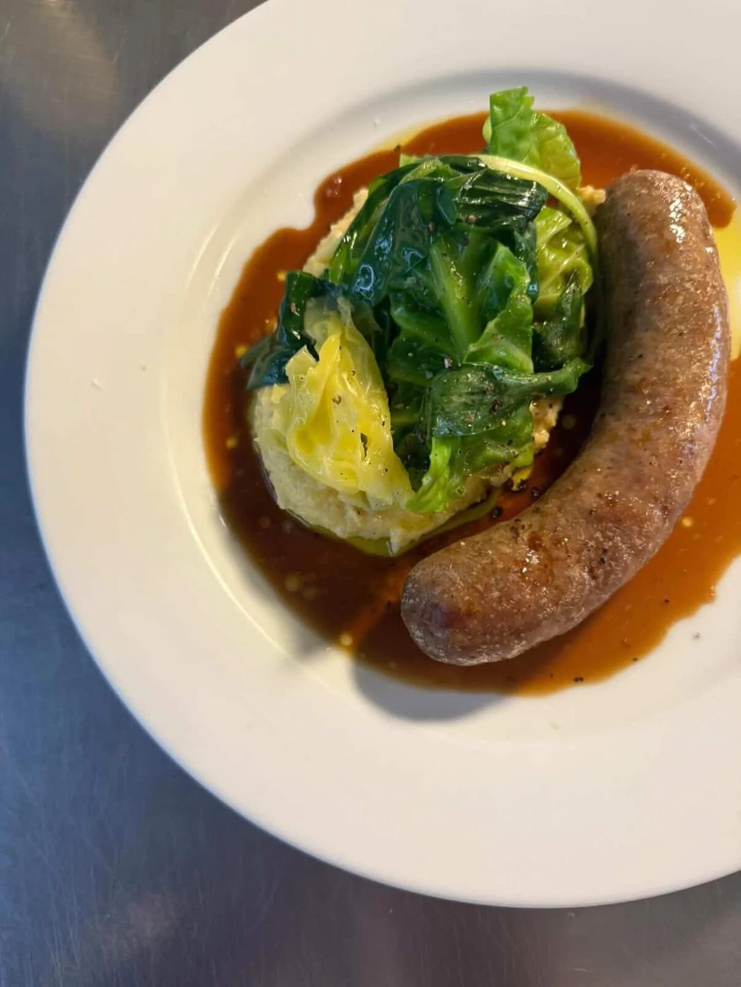 Weekday set lunch bangers are back! Using only the finest pork in the South West from @gothelneybutcher served with polenta taragna, Savoy cabbage and wild garlic.