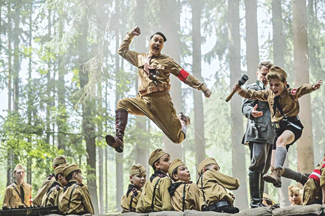 Jojo, inspired by his concept of Hitler her the beginning of the movie. The half-view of Sam Rockwell’s “what the hell is this kid doing"?” face is fantastic.