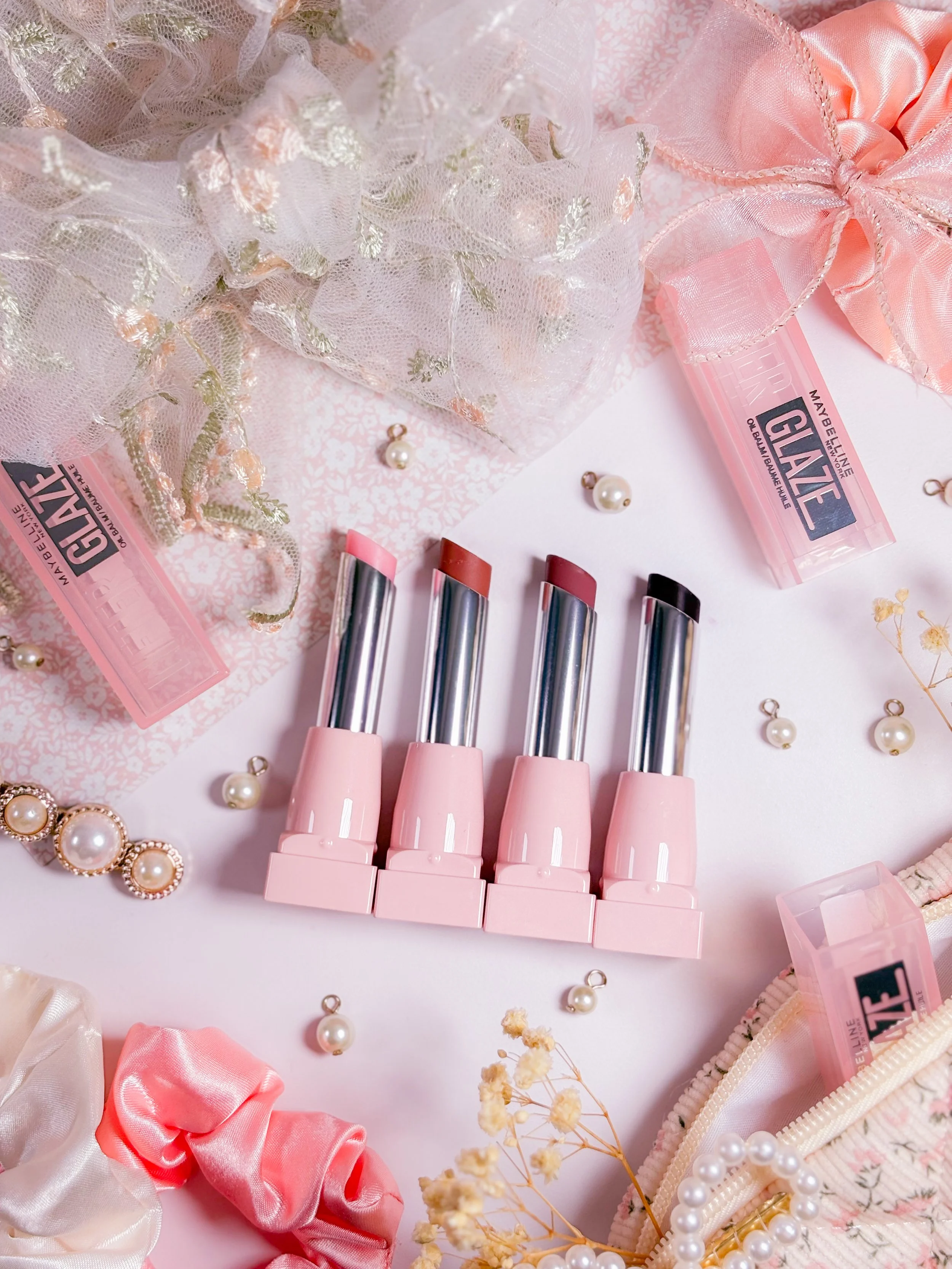 Nouveaux Lifter Glaze de Maybelline en teinte 002 Pink Drip, 006 Caramel Glow, 007 Berry Haze et 008 Acai Glaze