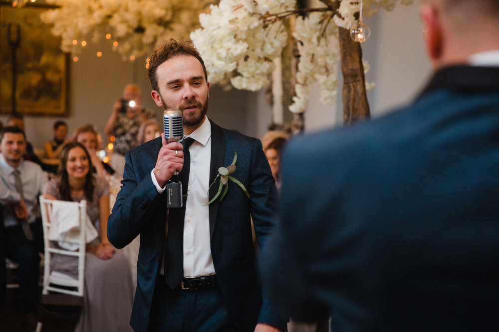 best man giving speech to guests