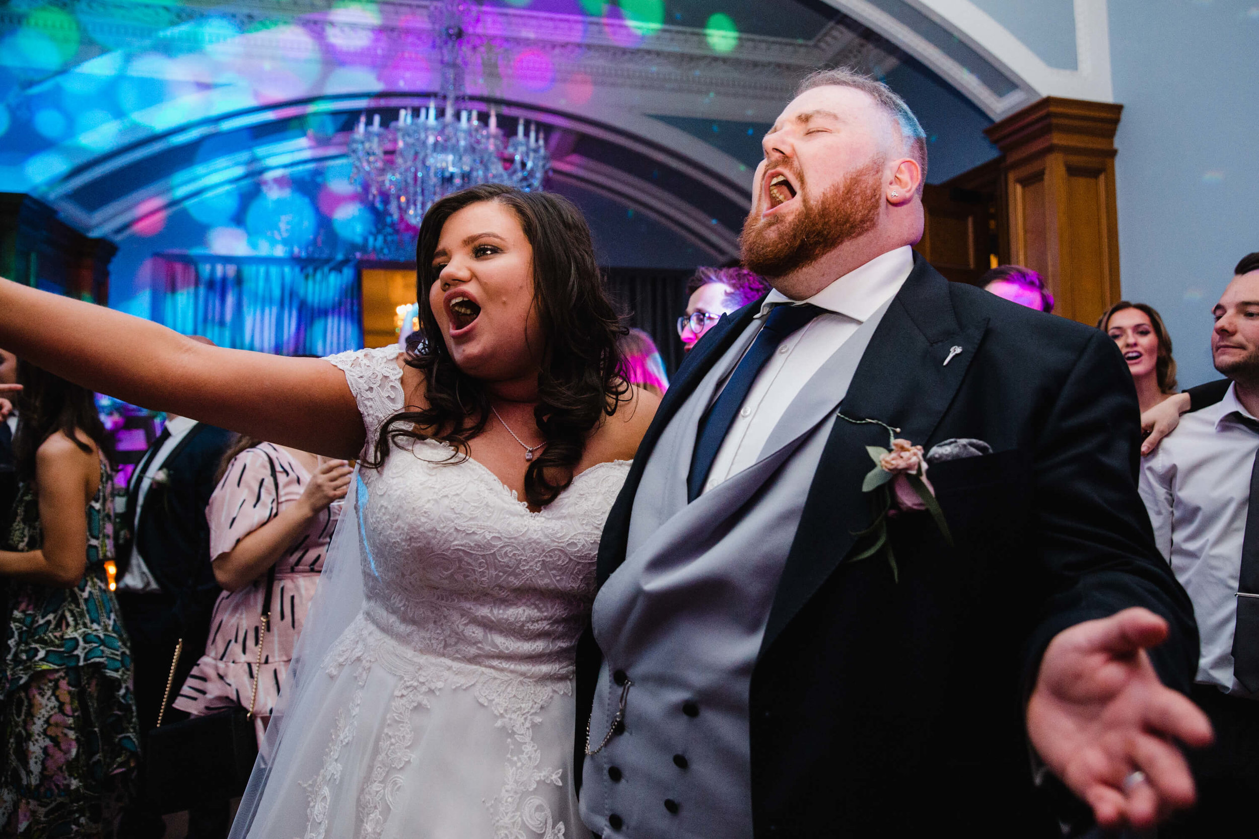 newlyweds celebrate on dancefloor at haigh hall