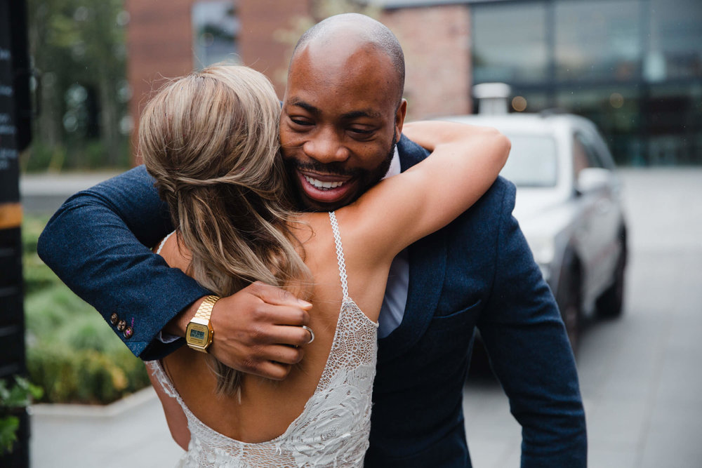 bride greeting wedding guest after ceremony