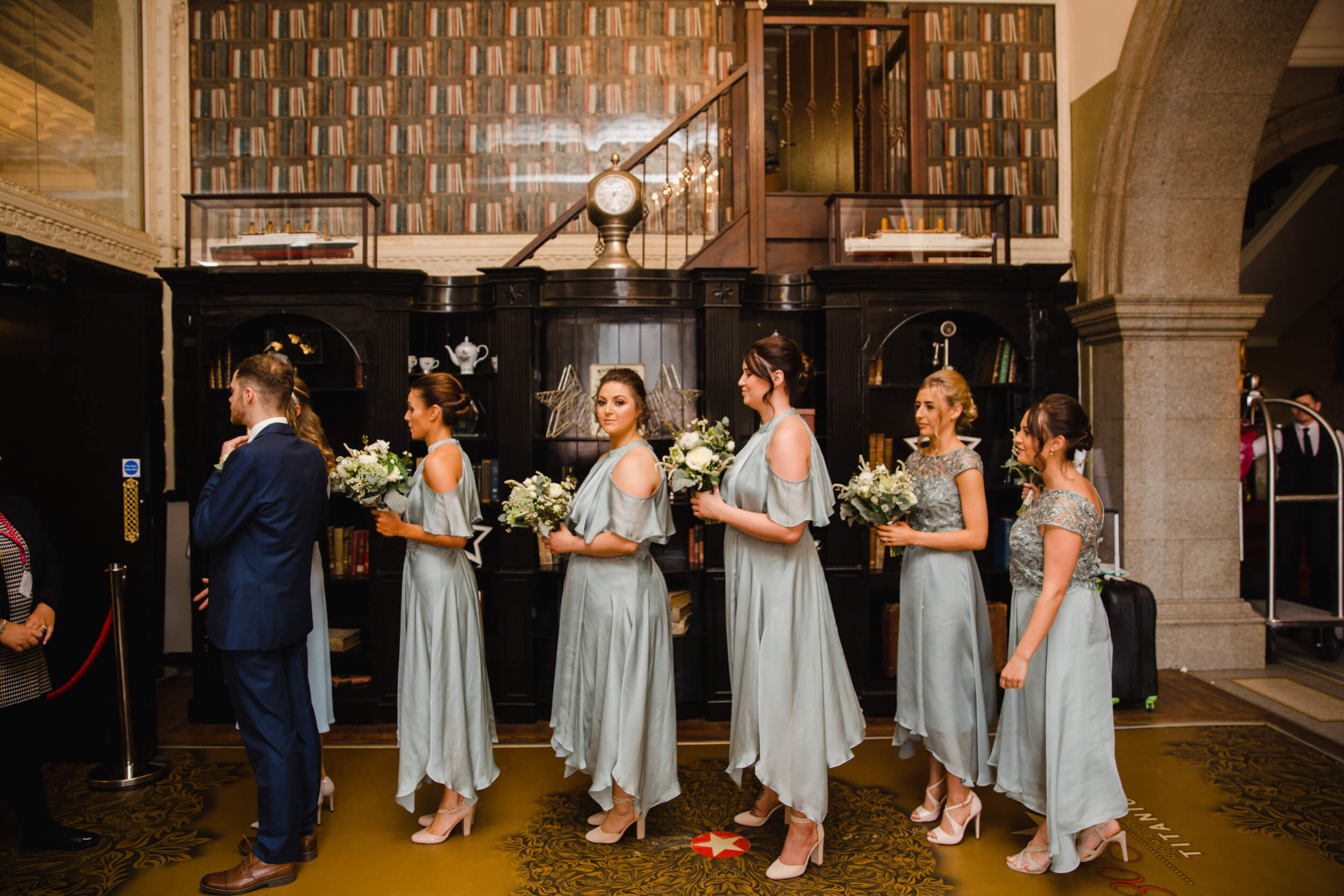 bridesmaids in hotel lobby awaiting the ceremony to commence