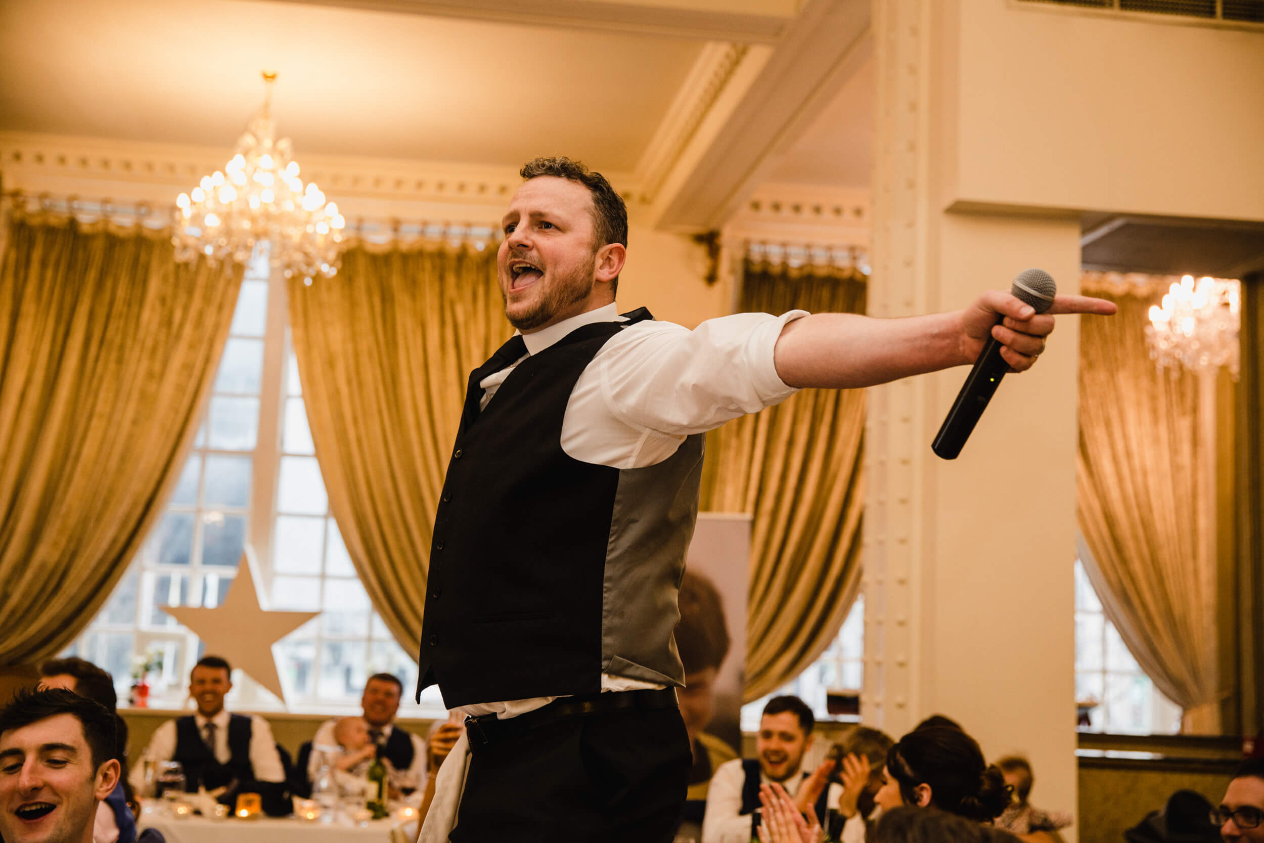 silver service singing waiters provide entertainment for wedding party