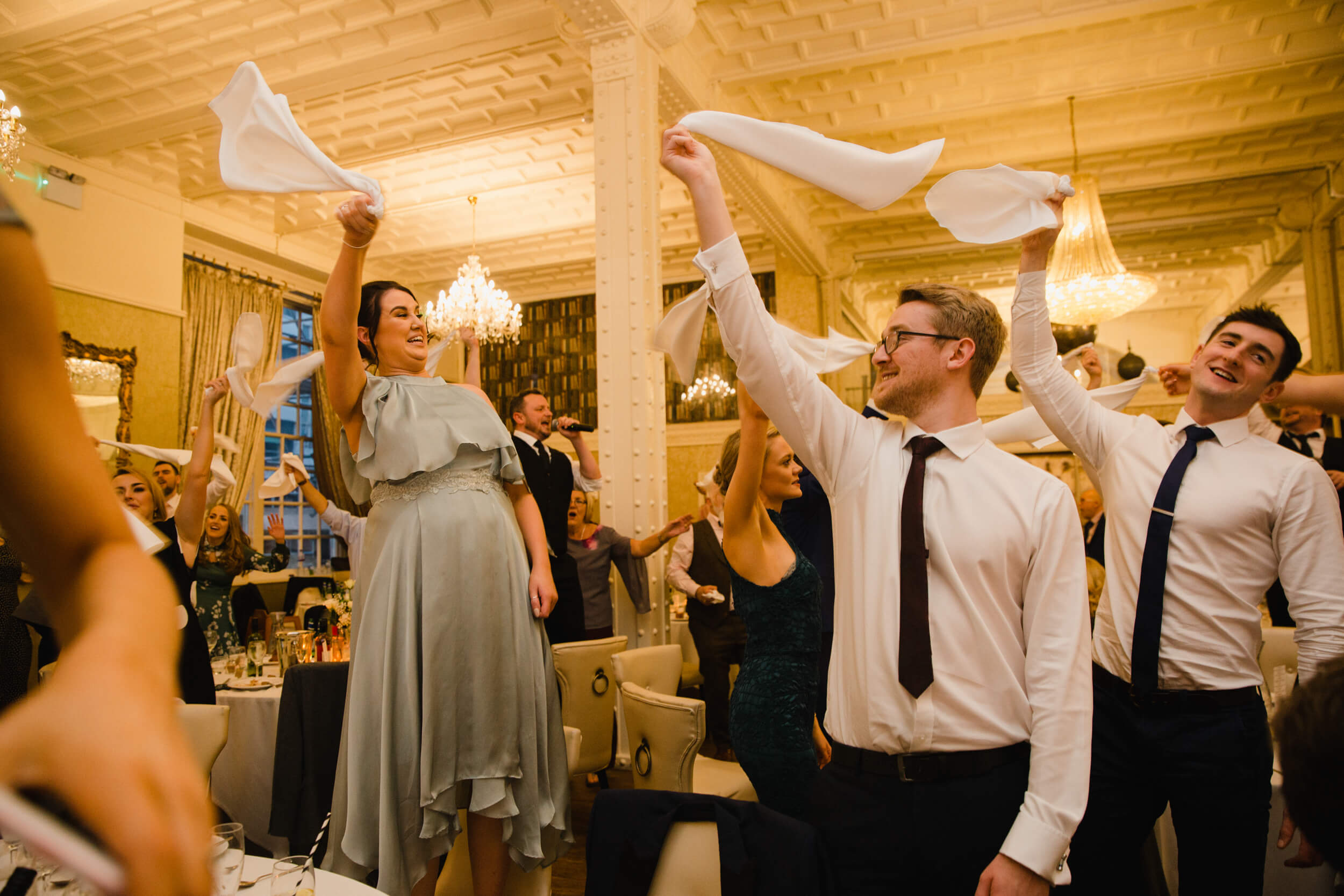 wedding party celebrating and dancing together