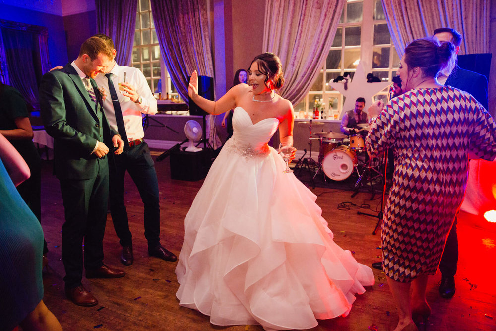 bride dancing with guests