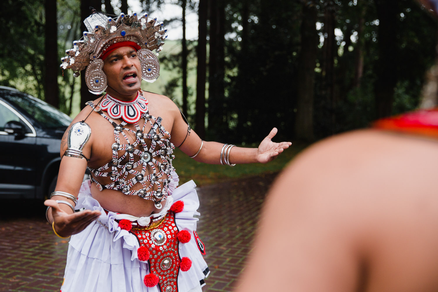 sri lankan dancer begins wedding ceremony processional with singing