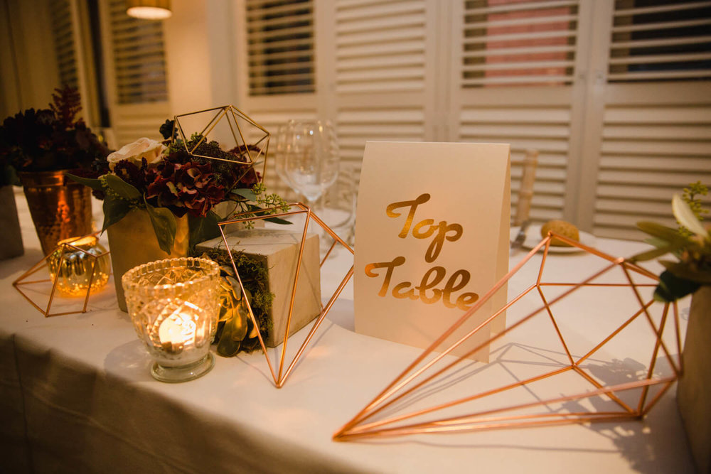 Copy of top table geometric design decorations for wedding breakfast