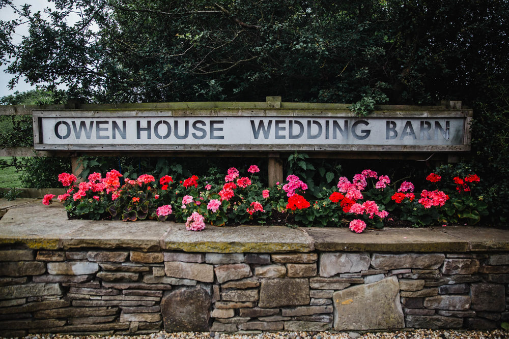 Quirky Owen House Wedding Barn door sign for venue