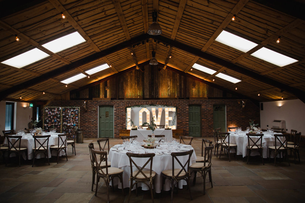 wide angle lens photograph of wedding breakfast set up