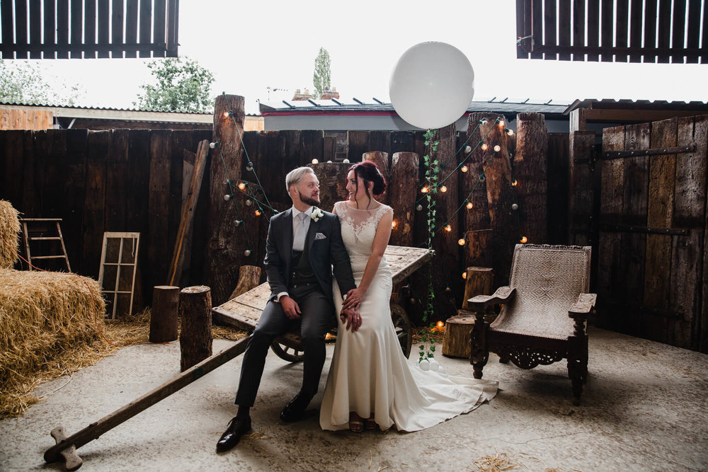 bride and groom share intimate portrait together at Owen House Wedding Barn