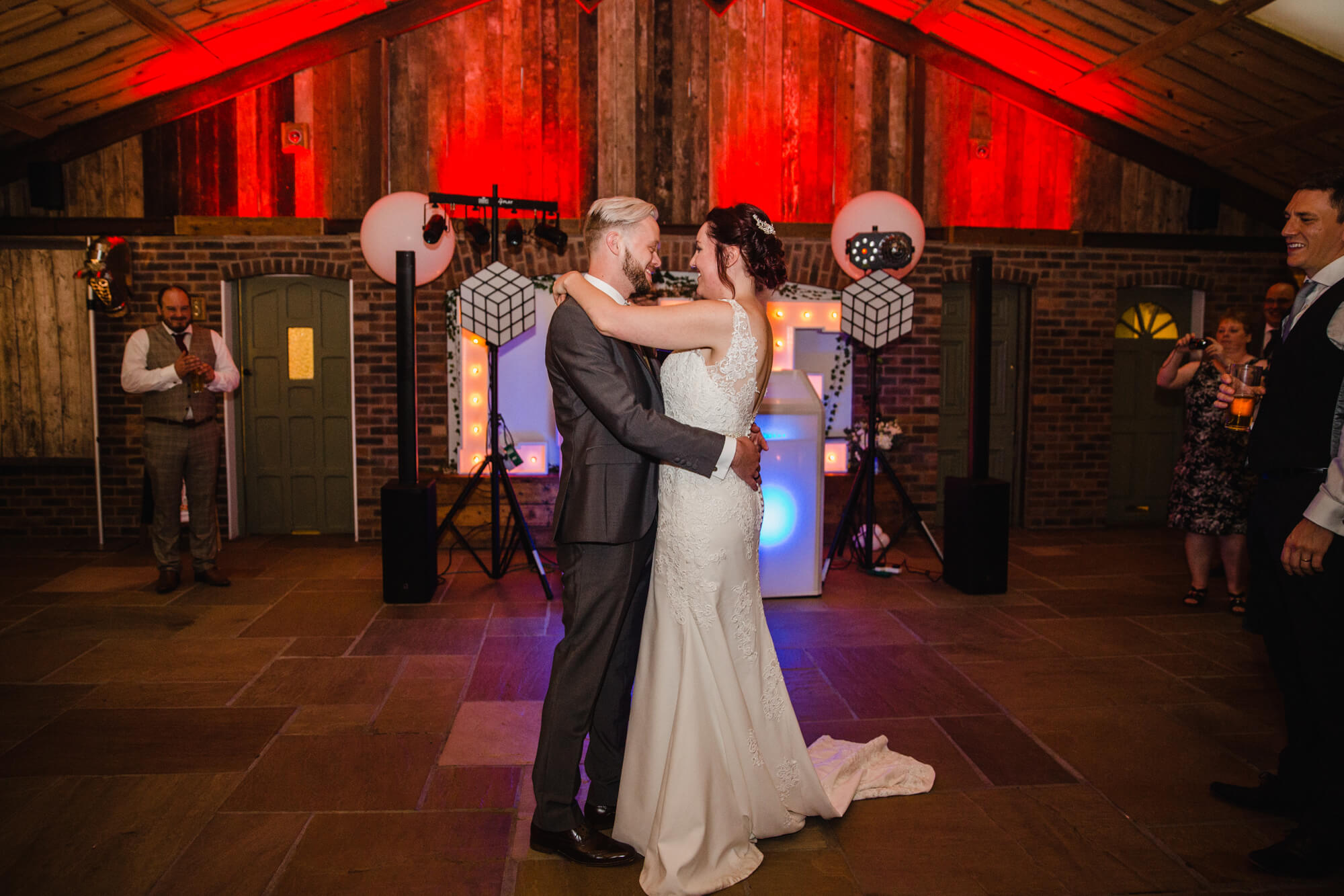 wide angle lens photograph of wedded couple on dance floor