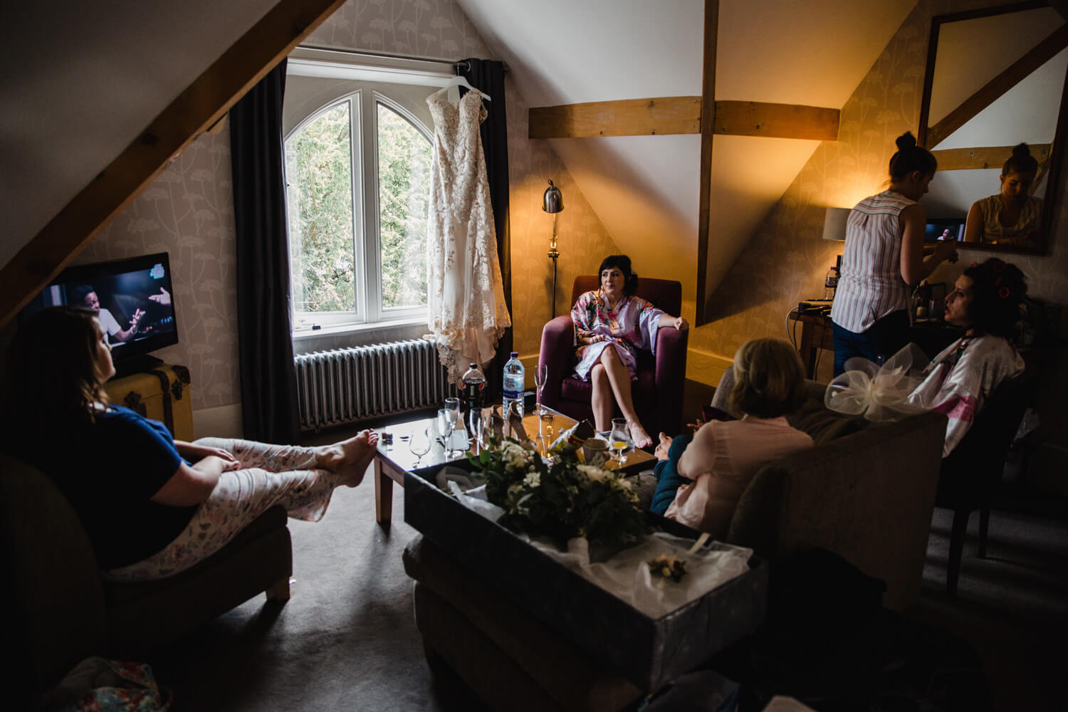 wide angle lens low light exposure photograph of bridal party before ceremony
