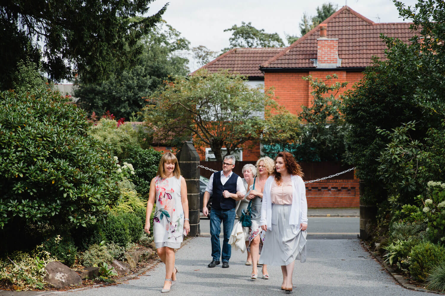 Wedding guests arriving for ceremony