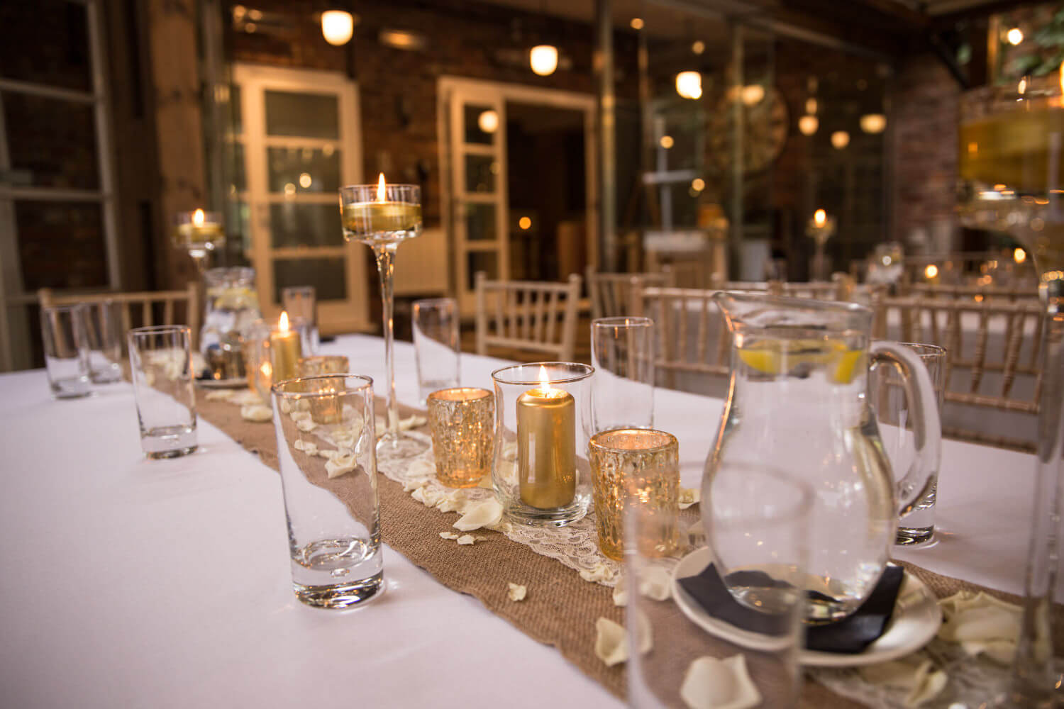 Aureum Events dressed the ceremony room and reception room with chiavari chairs and table furnishings which looked absolutely stunning