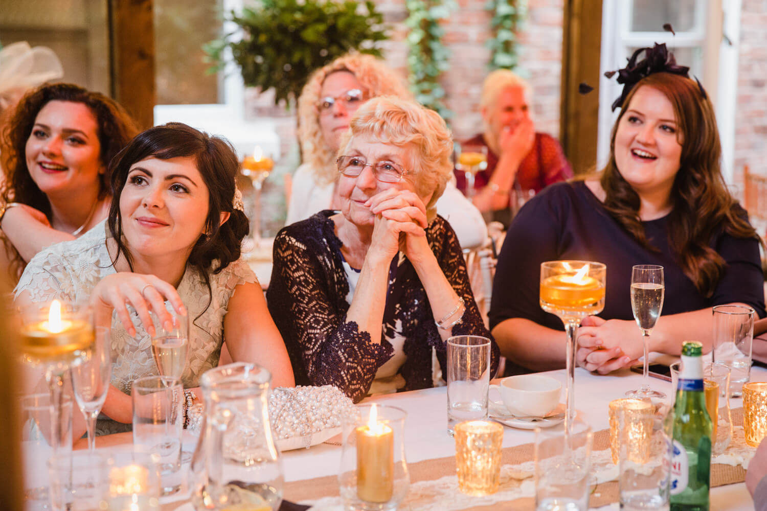 wedding guests listening to speeches
