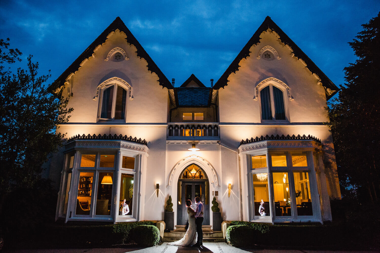 off camera flash lit photograph of bride and groom at Eleven Didsbury Park wedding venue