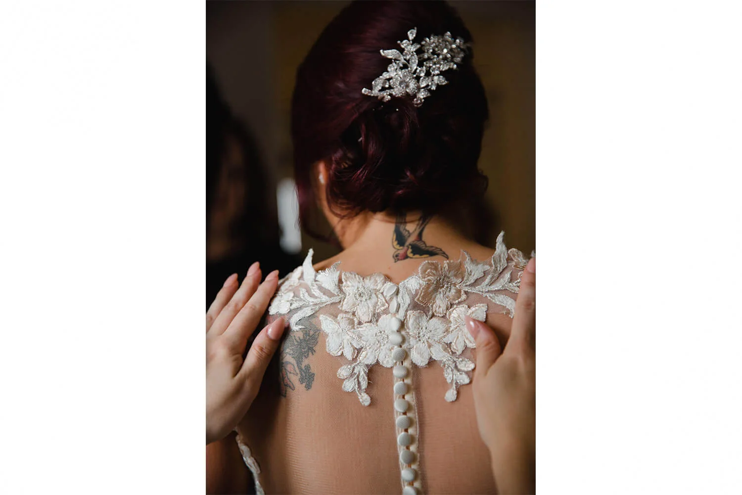 portrait photograph of buttons fastened for wedding dress detail