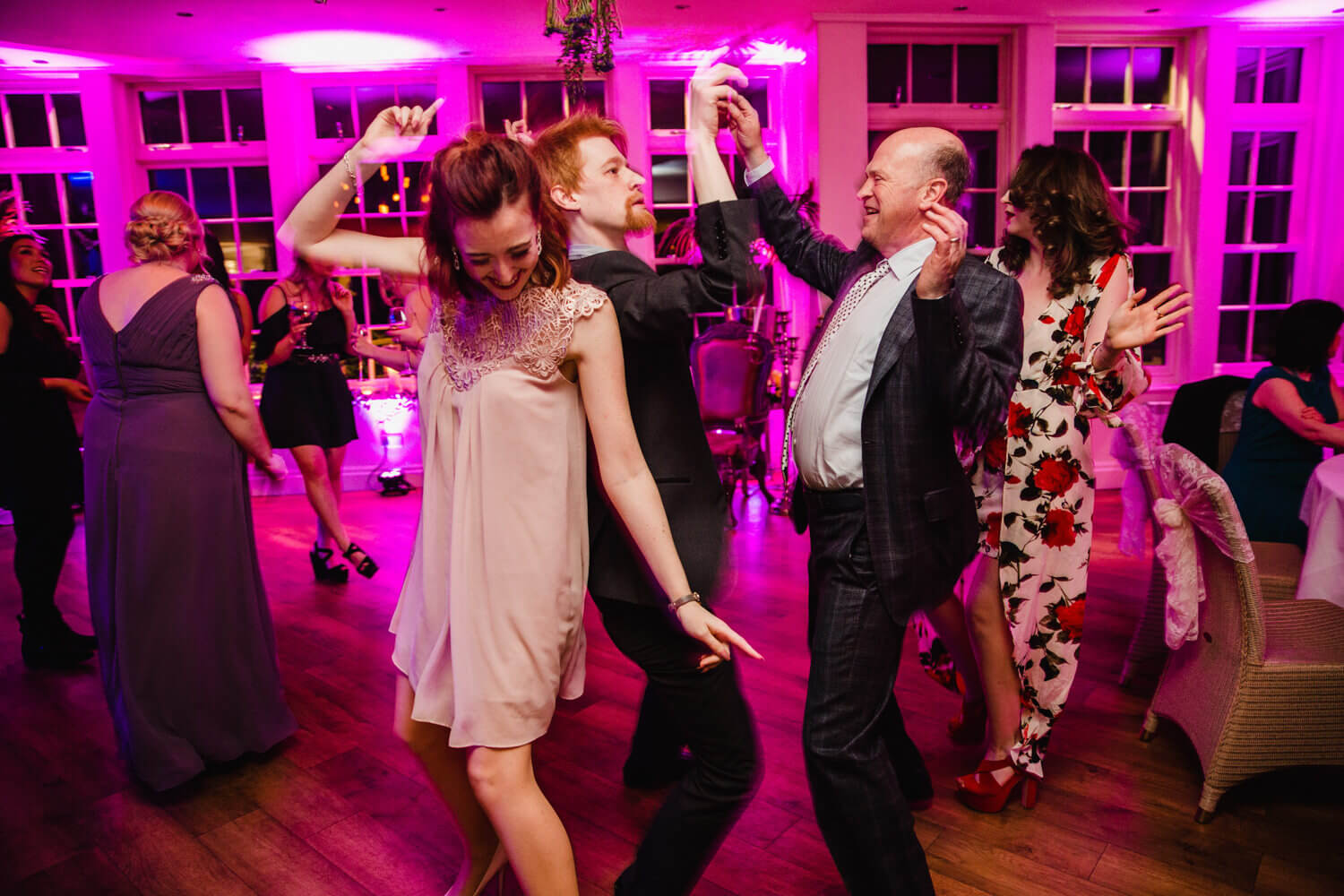 wedding guests party and dancing at Mitton Hall