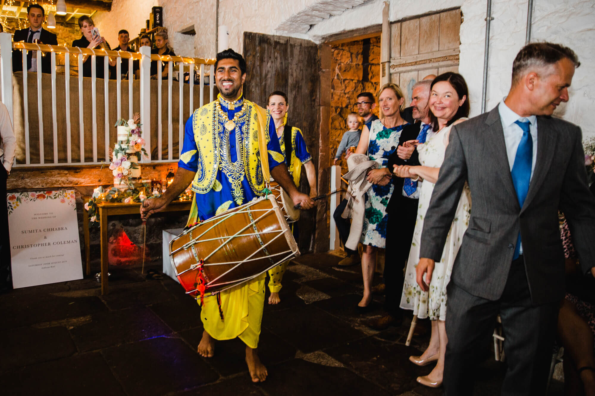 bhangra dancers enter for performance at end of nights