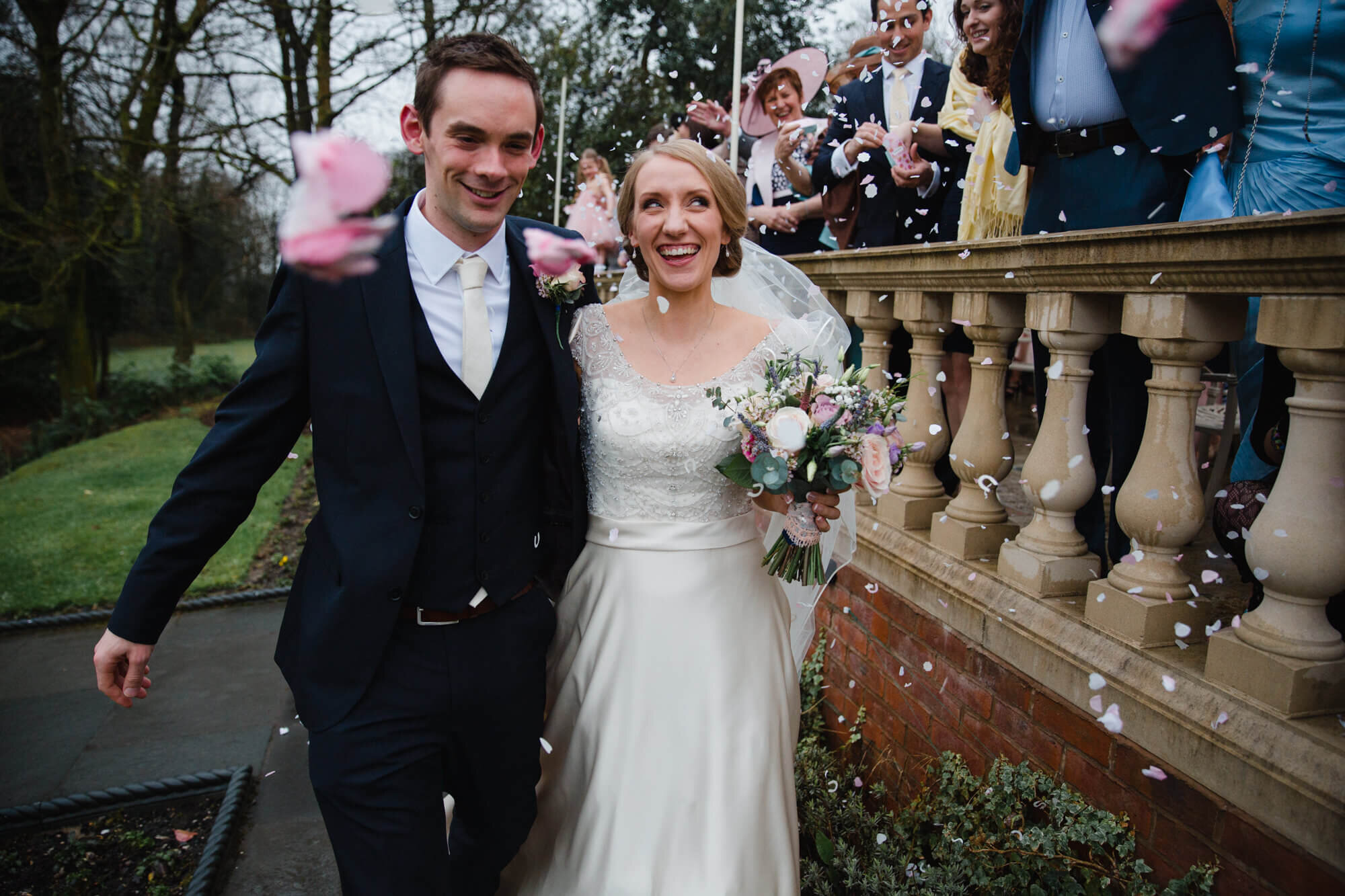 close up confetti photograph as newlyweds celebrate at Ashfield House