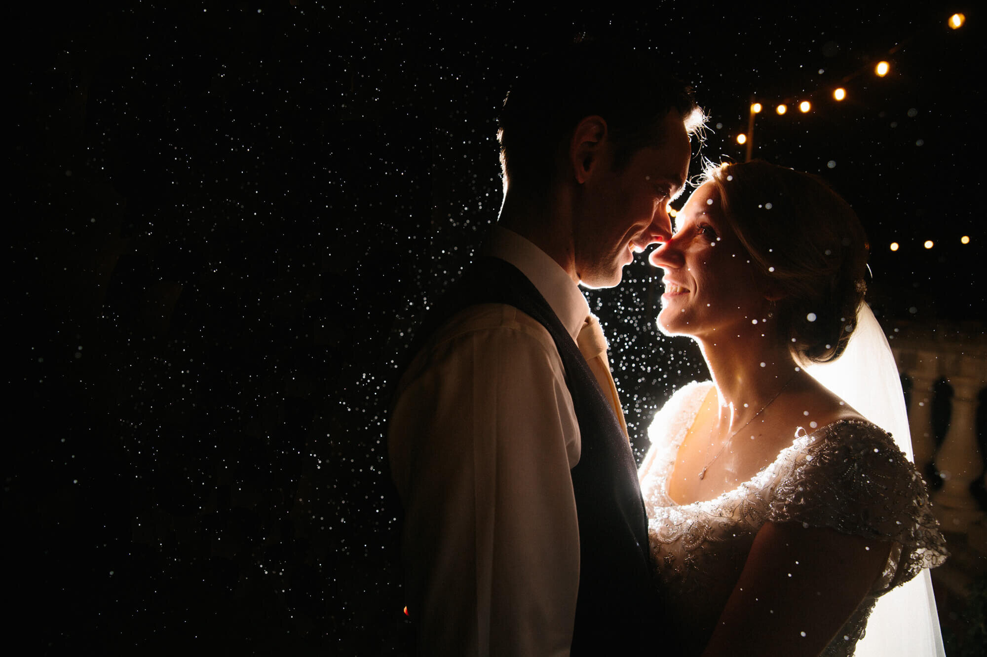 Award winning photograph of Bride and Groom together in rain at Ashfield House wedding venue