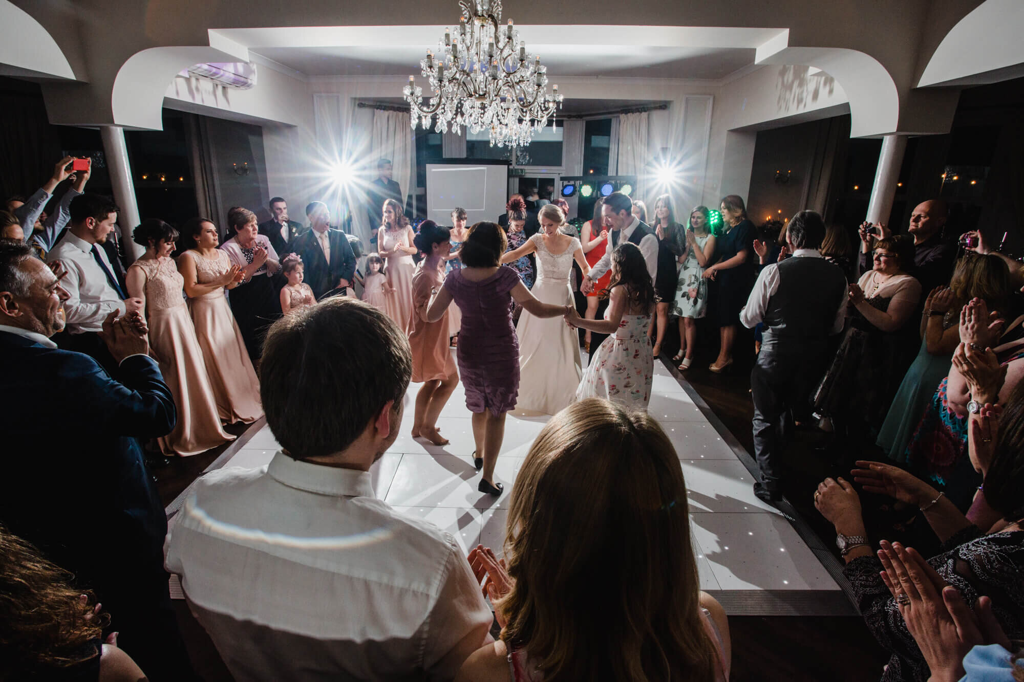 wide angle lens shot of wedding party at Ashfield House