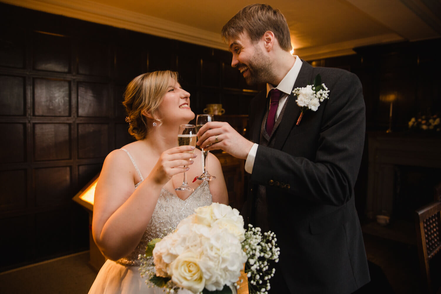 newly wedded couple share champagne after ceremony