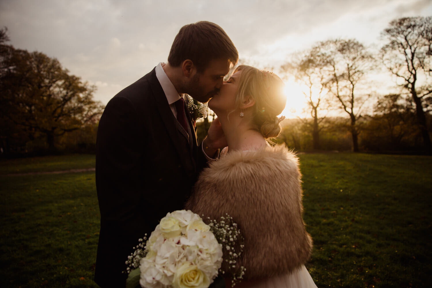 intimate kiss portrait of newlyweds at oakwell hall
