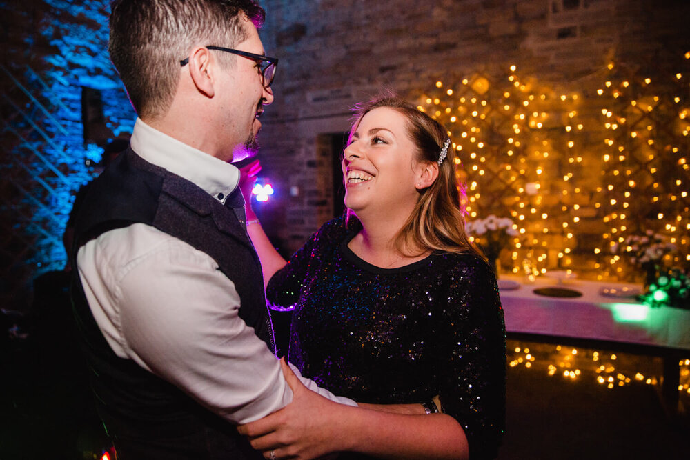 flash photography photograph of guests on dance floor
