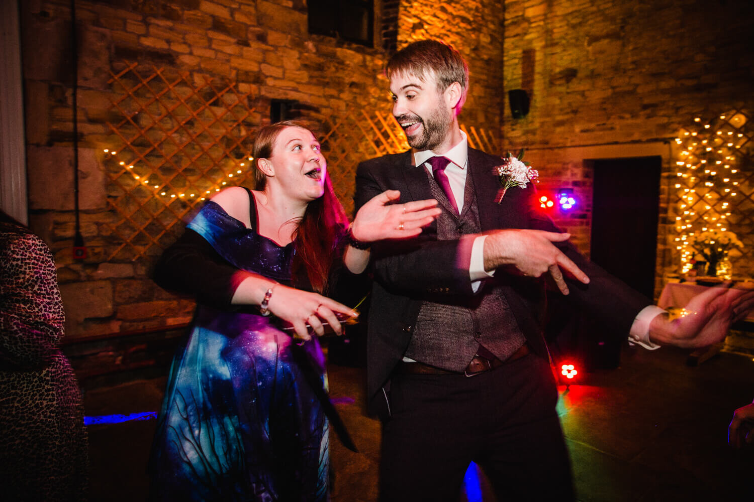 groom dancing with sister during party at Oakwell Hall