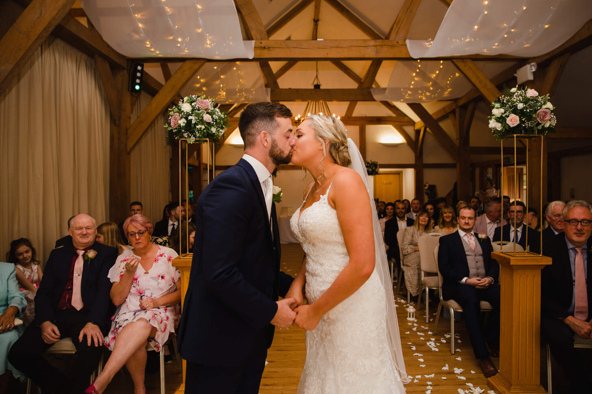 first kiss of bride and groom before processional