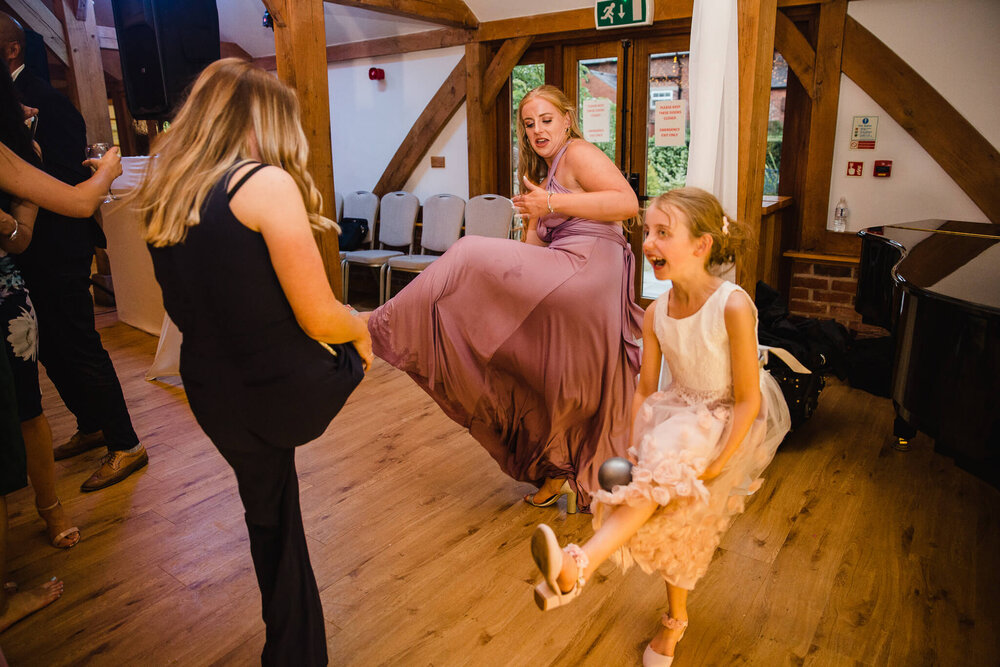 guests dancing to live band music