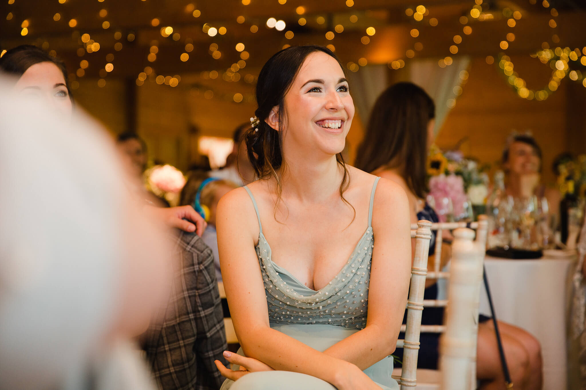 bridesmaid smiling at speeches