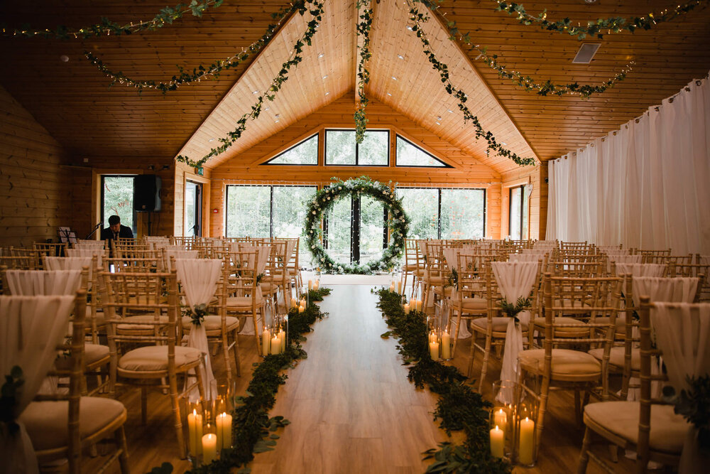 guests arriving and congregated in the entrance to the lodge